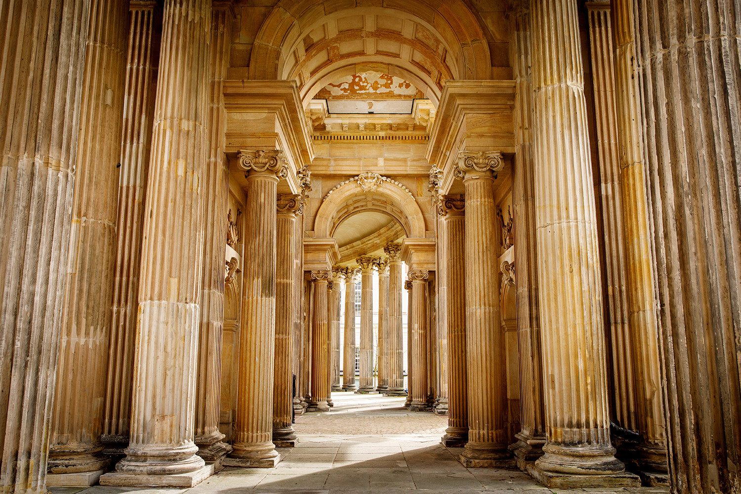 Architectural ensemble in Baroque style, columns and arches.