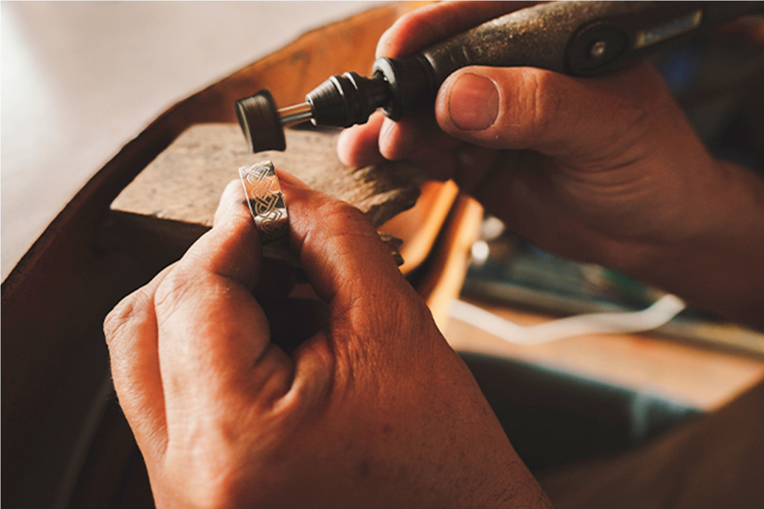 Jeweler working with his hands