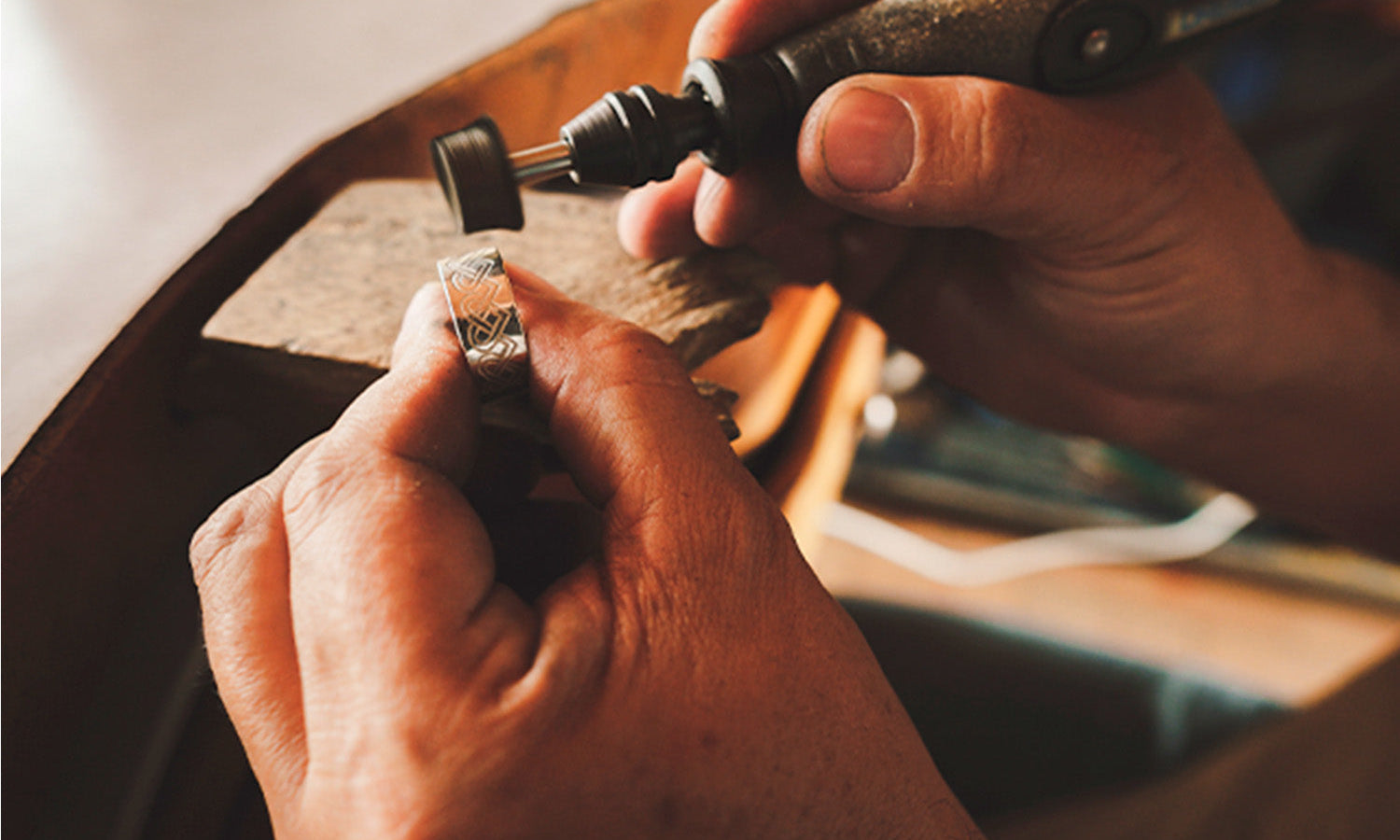 Jeweler working with his hands