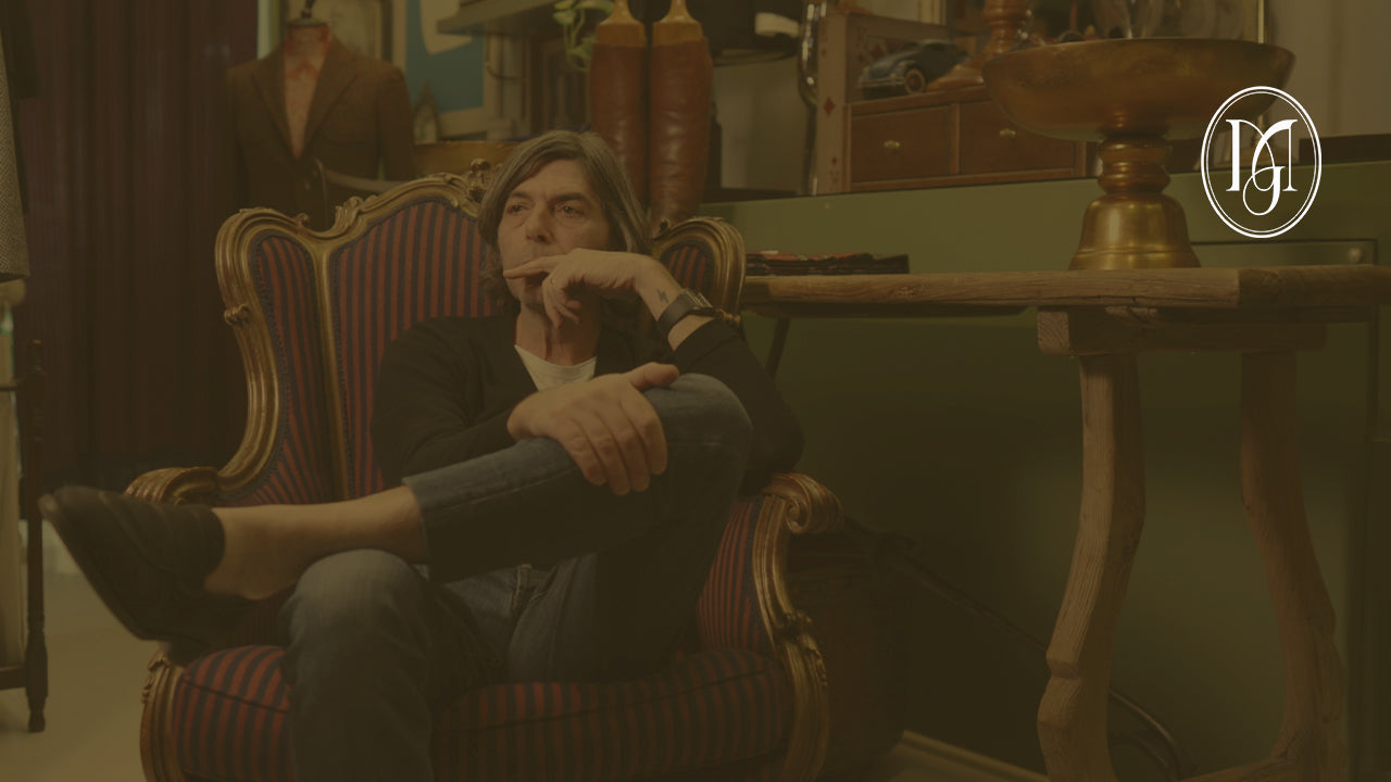 A man sitting on a sofa