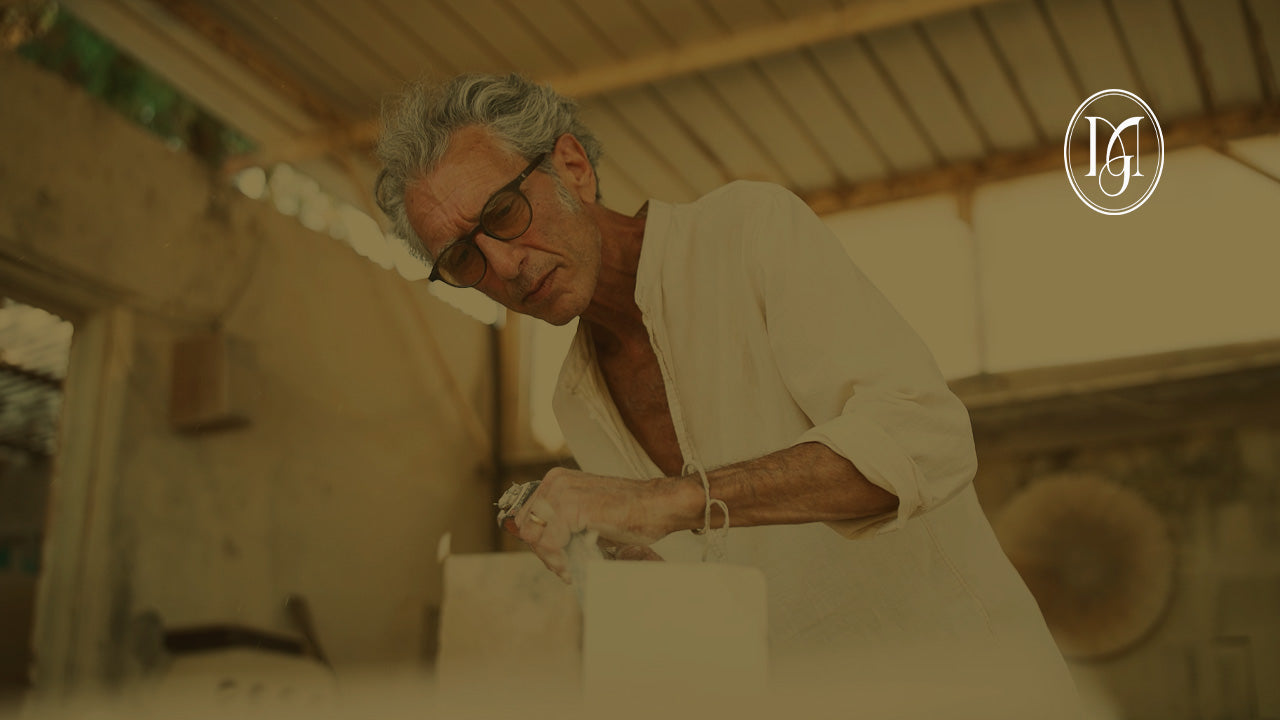 man working with stone